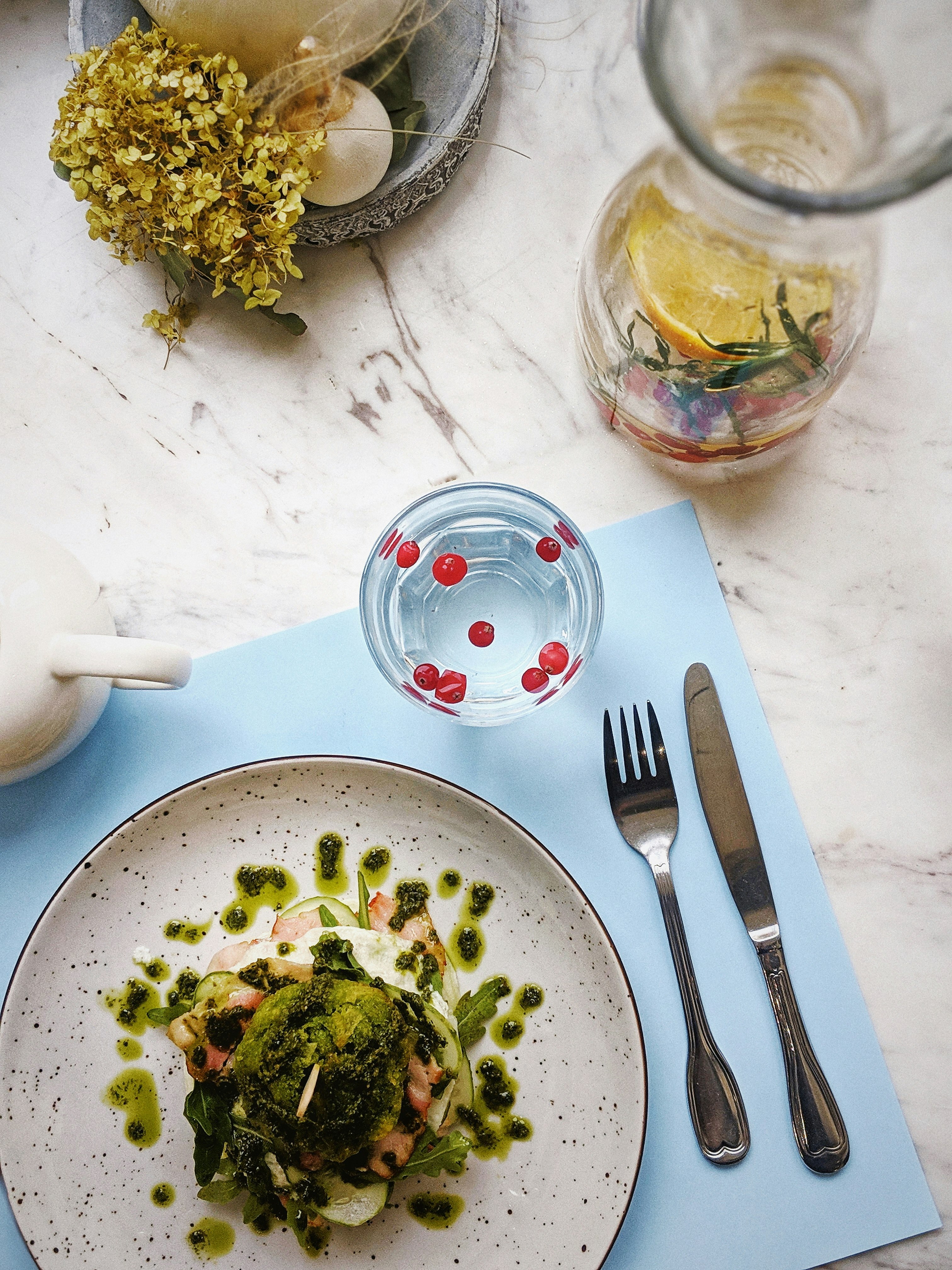 plate of food beside table knife and fork